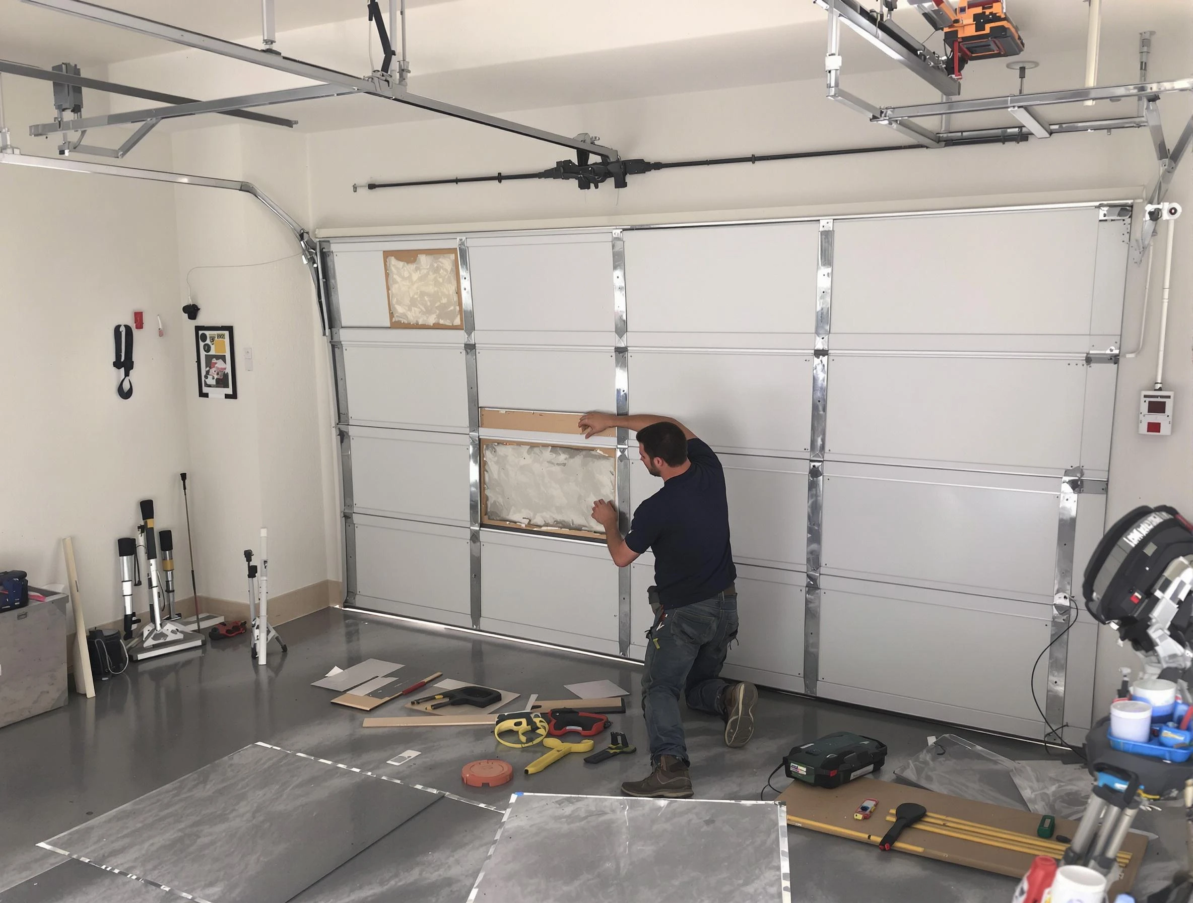 Garage Door Panel Repair in El Cerro